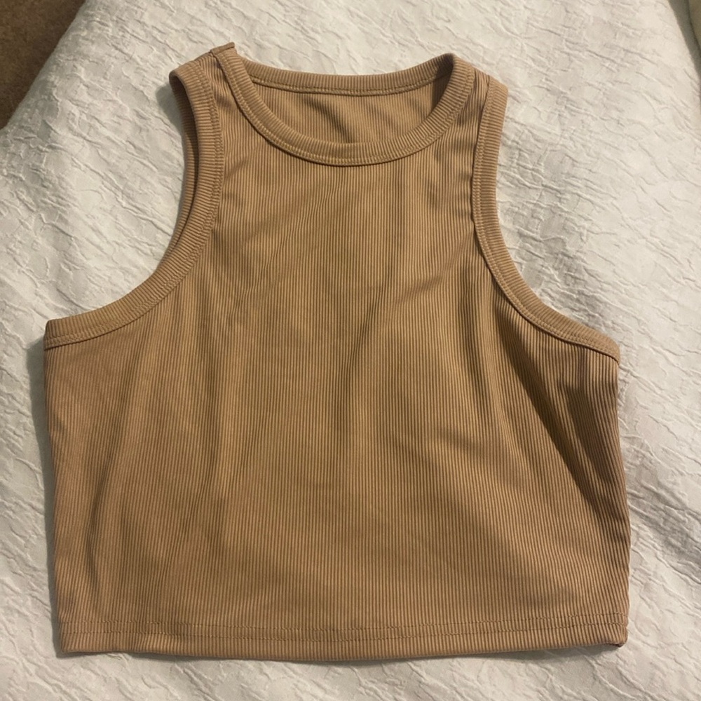 Women’s crop top size small. Good condition never worn.